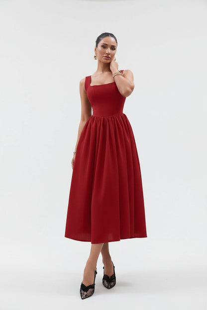women wearing a red elegant maxi dress