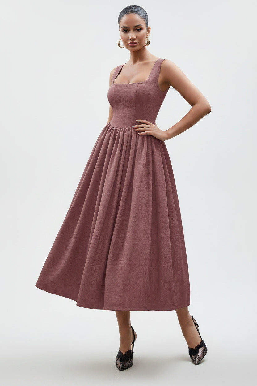 woman wearing a blush rose maxi dress