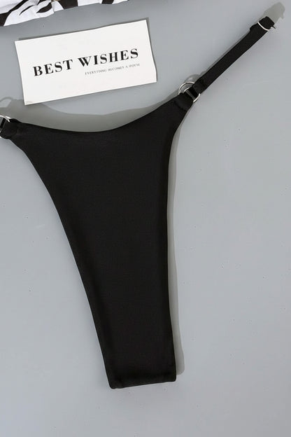 detail view of women´s swimwear in black and white and animal prints 