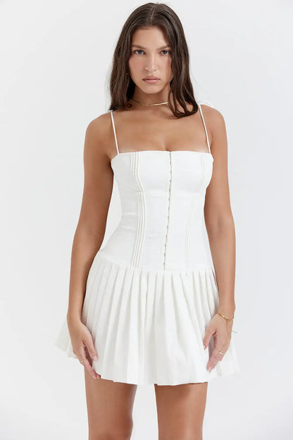 woman wearing white pleated mini midi dress 