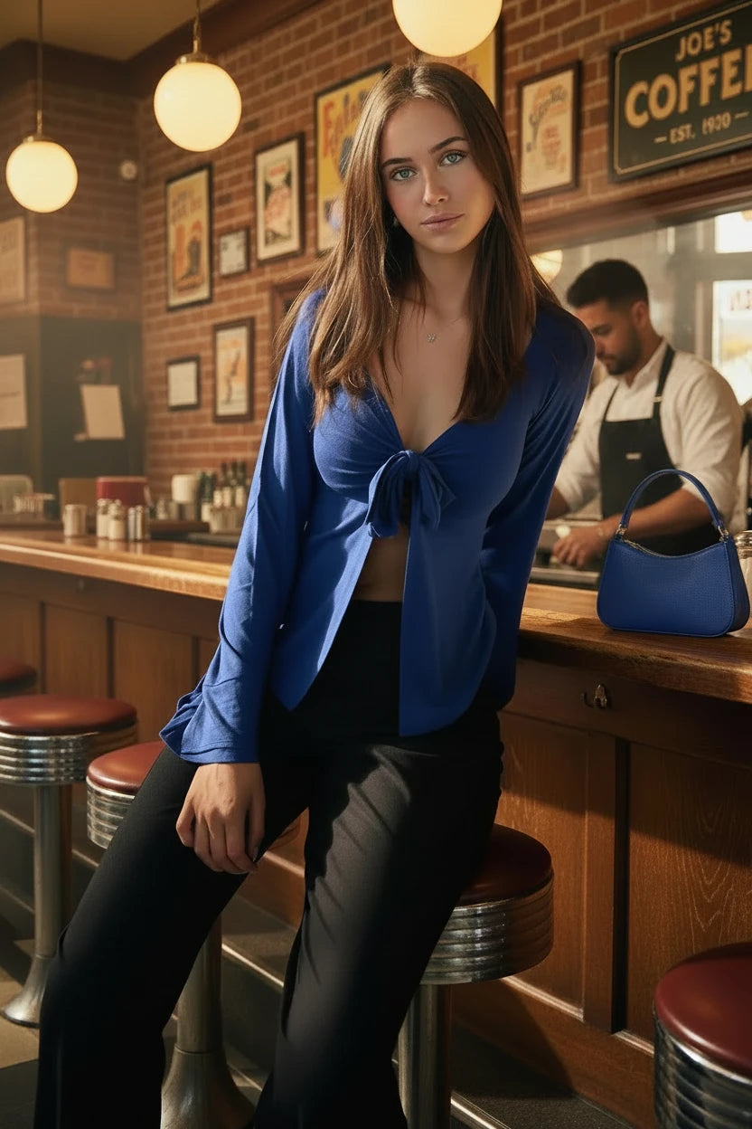 elegant navy blouse styled for a casual evening look