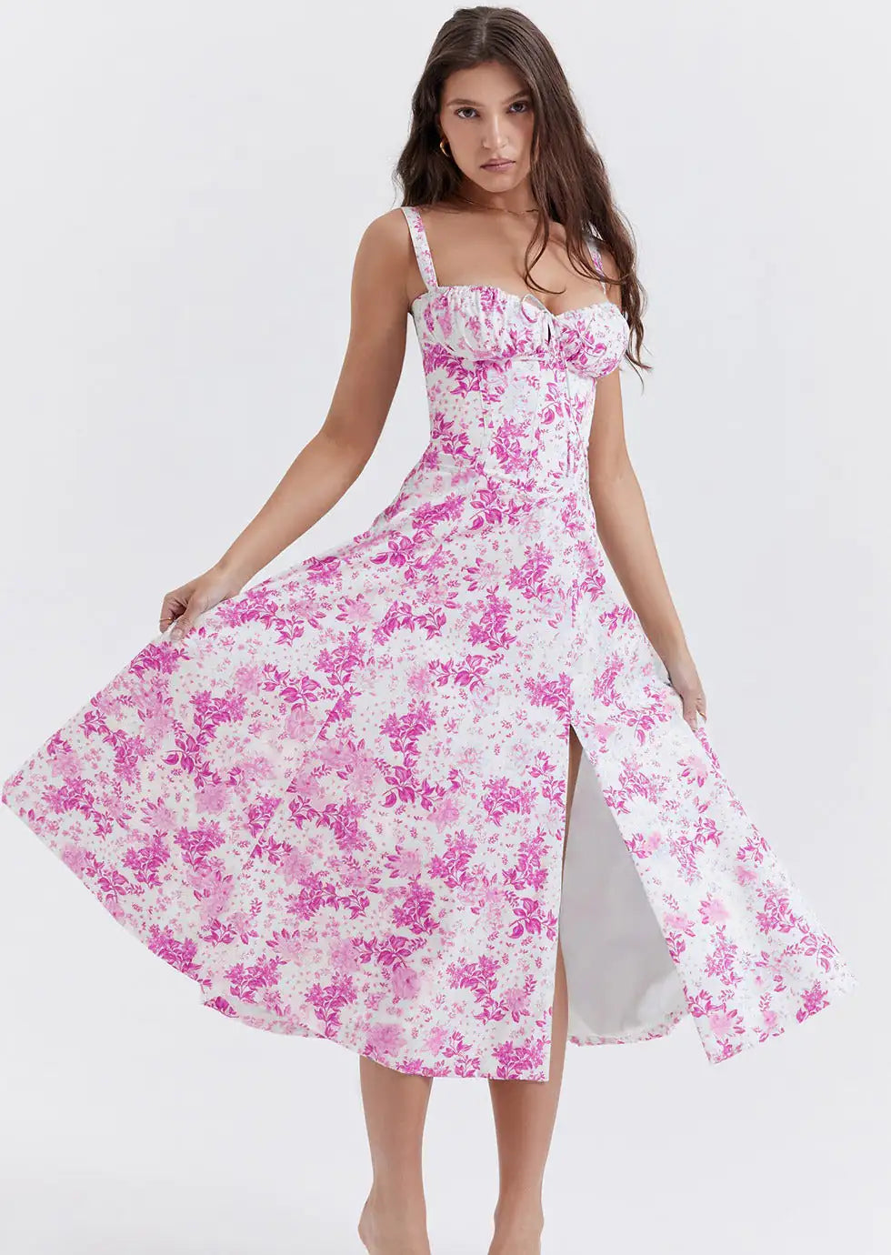 woman wearing a timeless floral designed pink and white dress