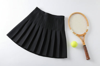 classic high-wasted mini skirt and tennis racket on a side